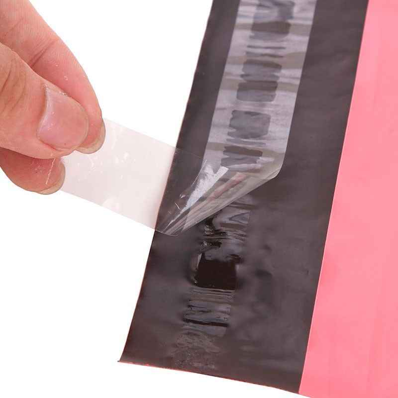 envelope plástico com fita autocolantes